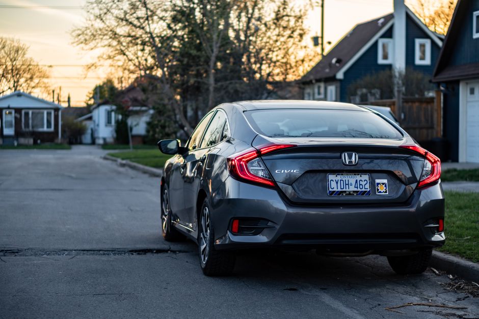 family using Honda trunk