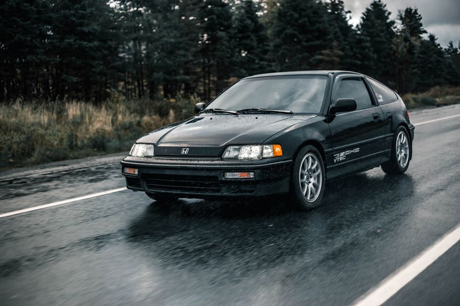 Honda driving on winding road